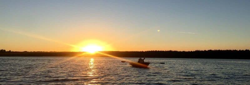 Balade en kayak sur la rivière Tramandaí au coucher du soleil