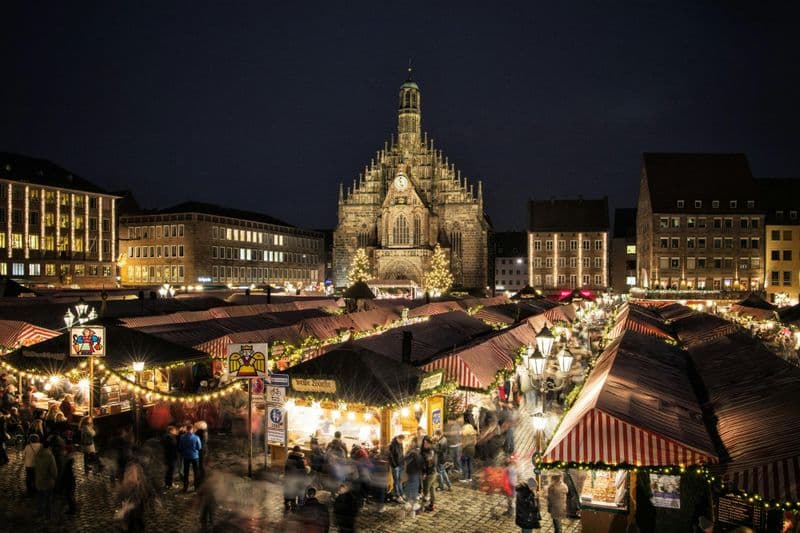 Guided tour of Nuremberg's Christmas market with street theatre