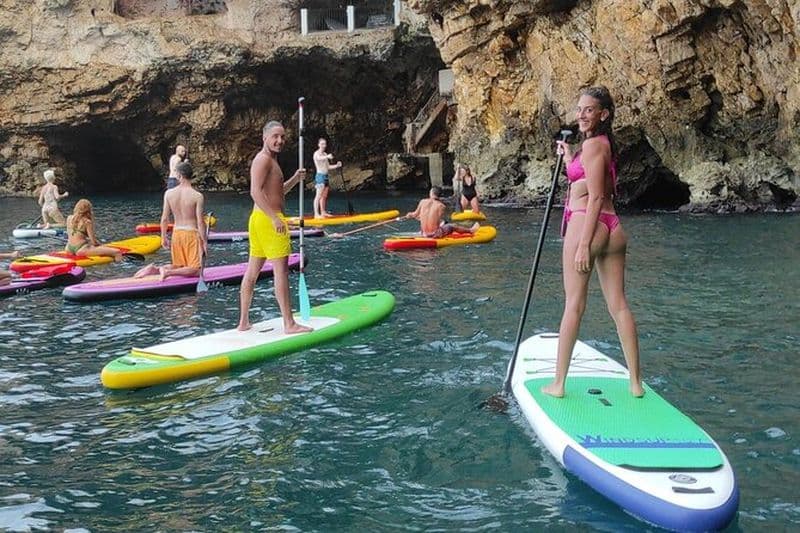 Balade en SUP dans les grottes de Polignano a Mare
