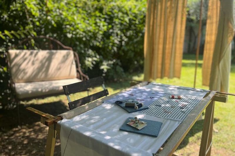 Atelier de broderie calligraphique du lac de Garde