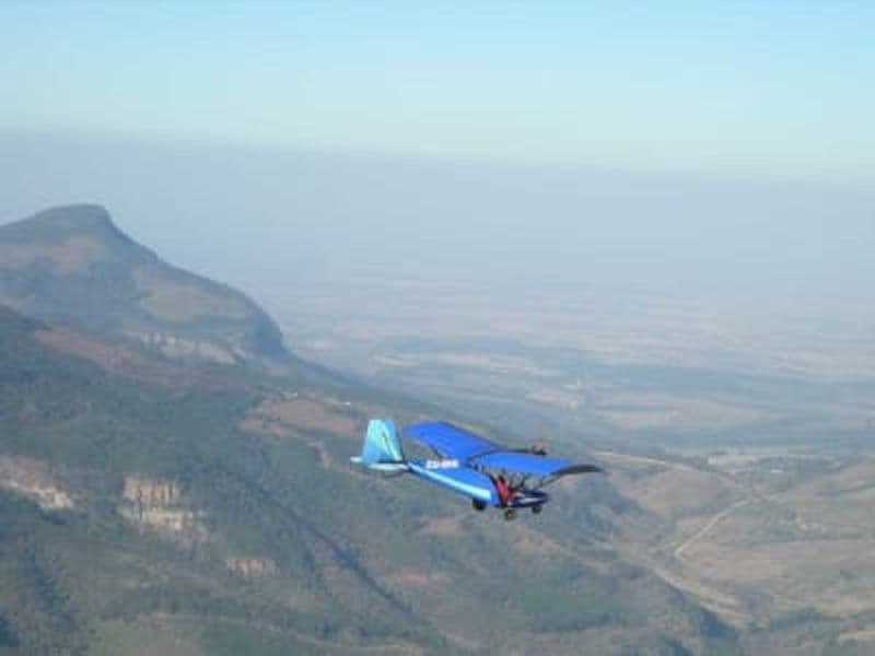 Billet Un ULM Bantam survole le Hoedspruit, Drakensberg