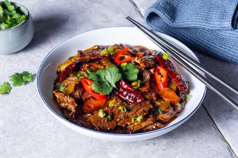 Londres : cours de cuisine chinoise avec banquet et vin