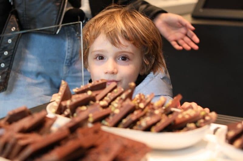 Visite de dégustation de chocolat à Genève dans un TaxiBike privé