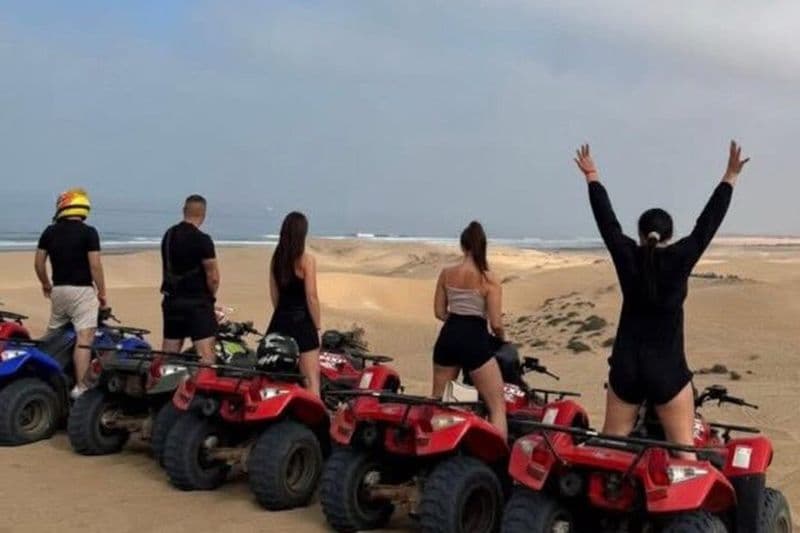 quad bike tour in the desert sand dunes